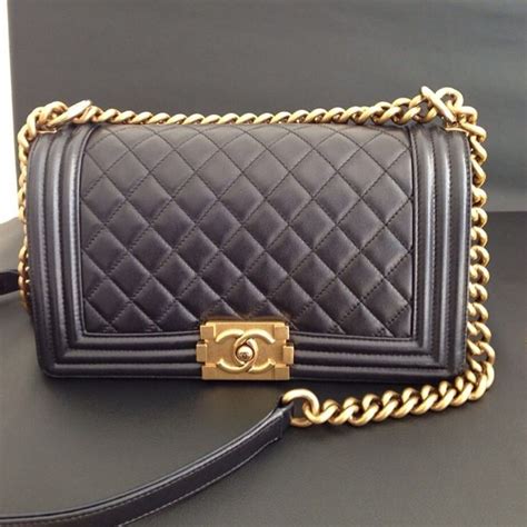 gold chanel boy bag|Chanel bag with gold chain.